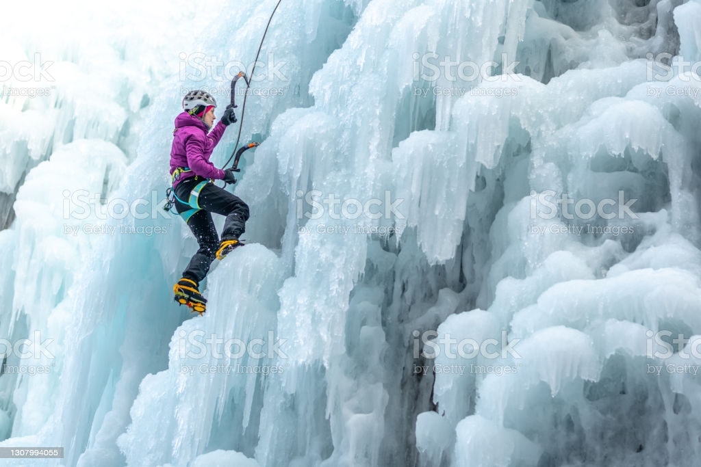 women top rope ice climbing in ice park